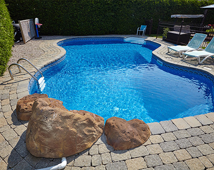Pool repairs Cape Town - restored swimming pool with new paving