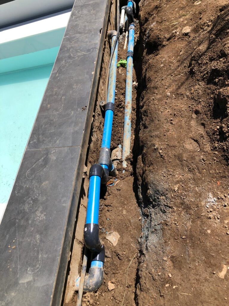 Pool leak detection and pipe repair Cape Town: new pipes laid in trench