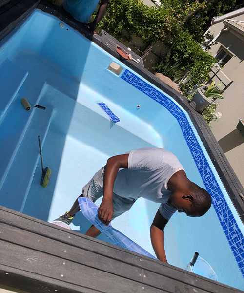 Pool relining cost Cape Town - applying a new pool surface coat