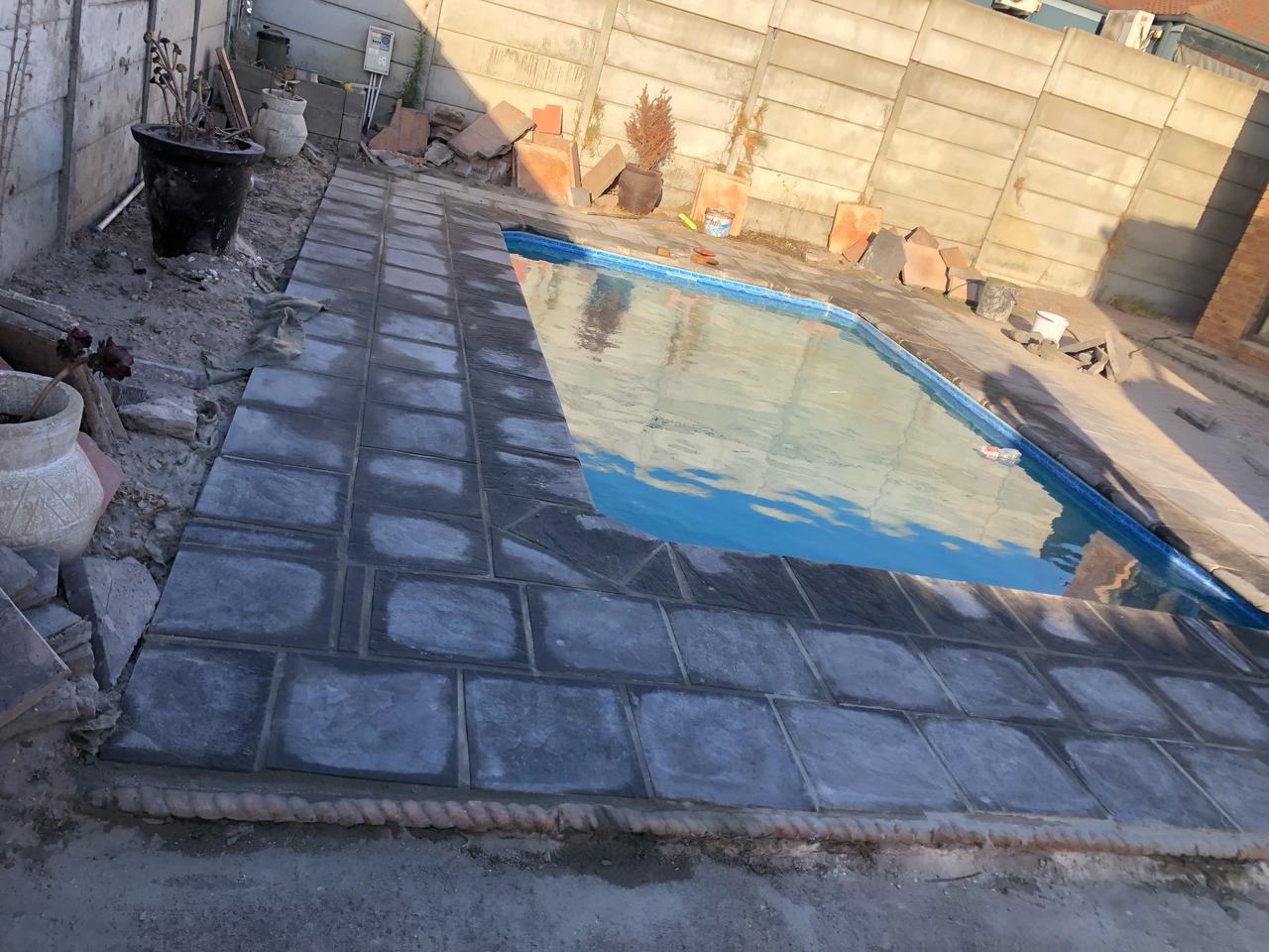 Pool renovations Cape Town - relined pool with new paving