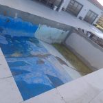 pool relining Cape Farms before - peeling marbelite and rough surface