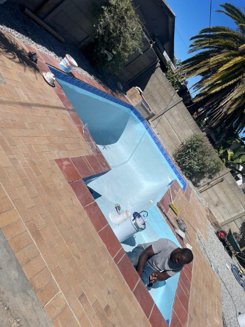 pool relining Kraaifontein prep — failed surface stripped back to the shell