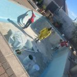 pool relining Monte Vista prep - old failed fibreglass stripped back to shell