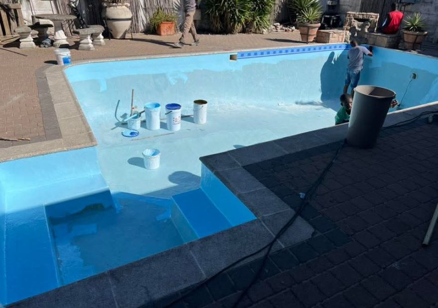Cloudy Pool Water: The Real Causes and Quick Fixes | Gibbs Pools pool relining Monte Vista in progress - crew bonding the new fibreglass lining