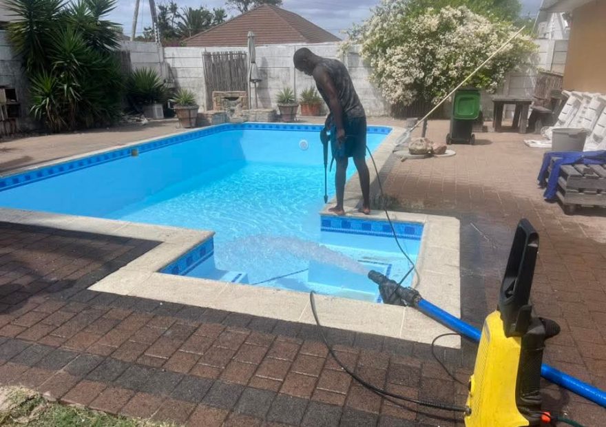 pool relining Monte Vista after - relined pool being filled and cleaned