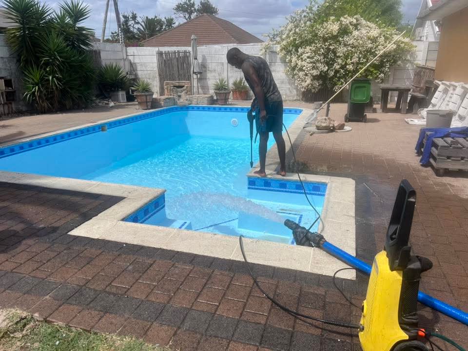 pool relining Monte Vista after — relined pool being filled and cleaned