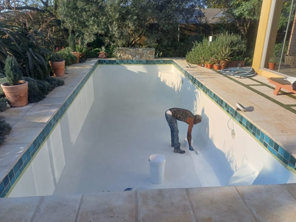Pool repairs Panorama: crew finishing new fiberglass surface