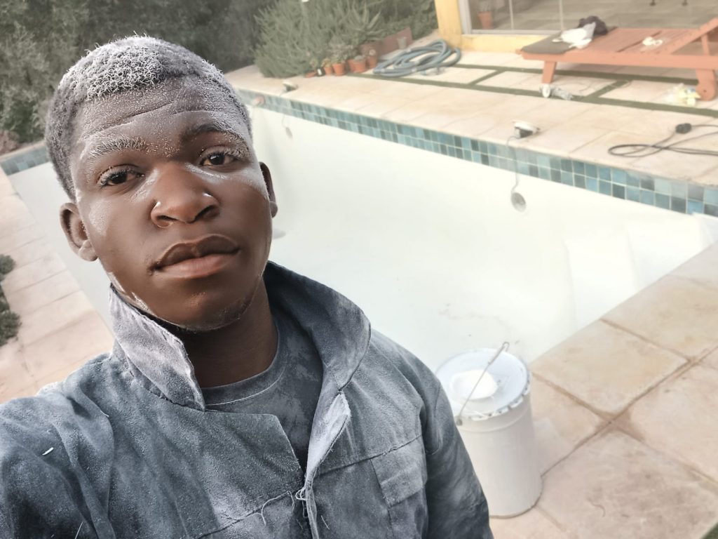 Durbanville Fiberglass Relining: 8x4m Pool from Leaking to Summer Ready | Gibbs Pools Gibbs Pools crew member at Durbanville fiberglass relining project