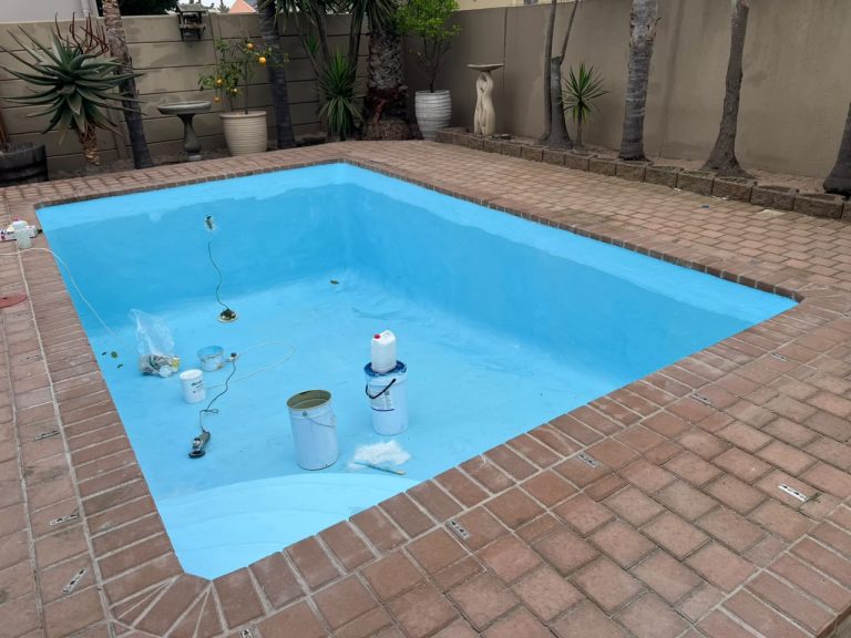 Loose fibreglass pool before relining Table View: green leaking water