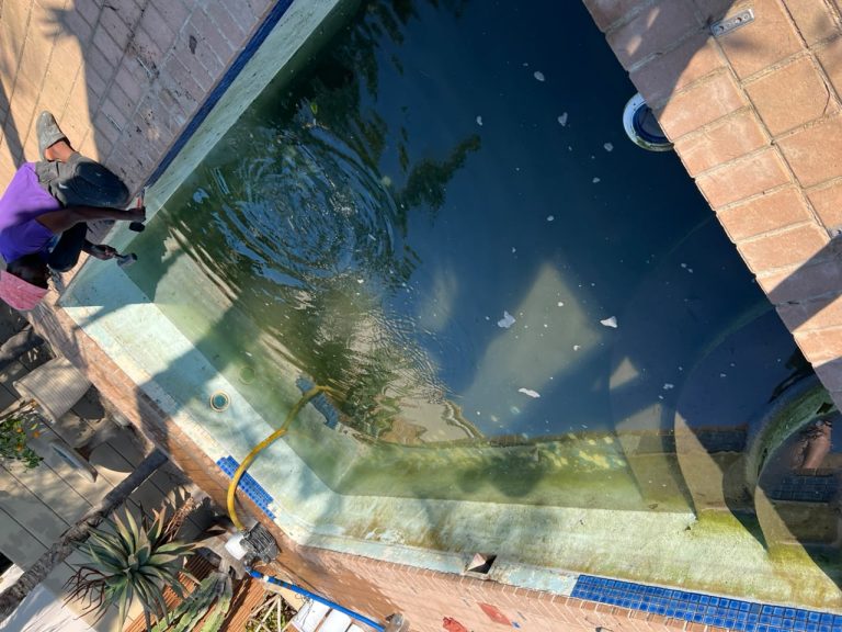 Pool drained showing loose lifting fibreglass Table View