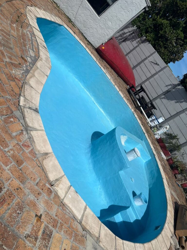 Pool renovation Kraaifontein: relined gunite pool with fibreglass steps and seat