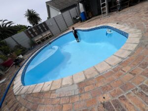 Gunite pool relining Kraaifontein: finished 7x5m fibreglass pool filled, R33,785 VAT included