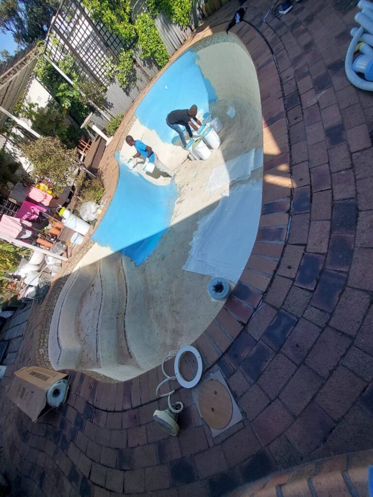 Fibreglass lining Rondebosch: crack repair and fibreglass layers on an old gunite pool