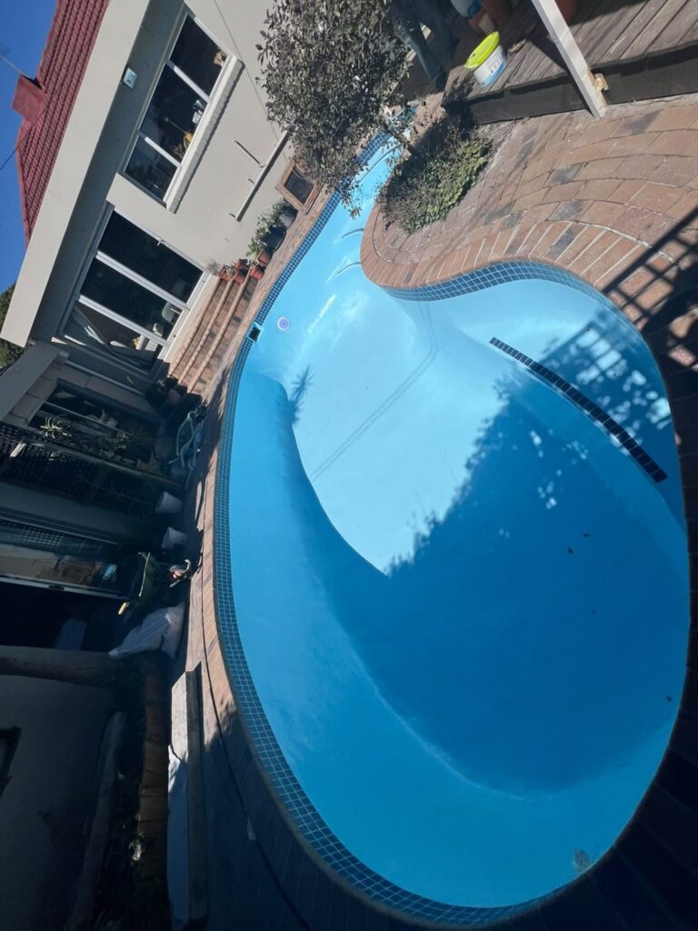 Gunite relining Rondebosch: crystal clear fibreglass pool filled and ready for summer